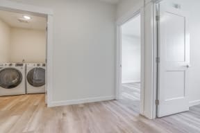 a laundry room with a washer and dryer
