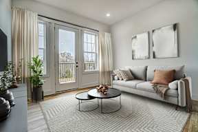 a living room with a couch and a coffee table