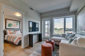 a living room with a couch and a chair