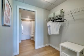 a walk in closet in a 555 waverly unit