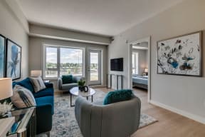 a living room with a view of a bedroom