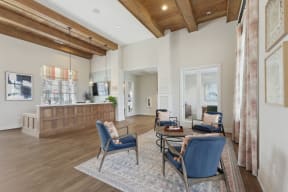 a living room with a couch chairs and a coffee table south twenty cartersville ga