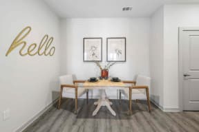 a dining room with a wooden table and white chairs south twenty cartersville ga