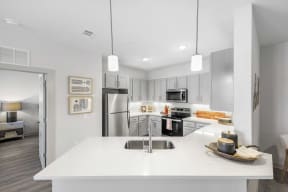 a kitchen with white countertops and stainless steel appliances south twenty cartersville ga
