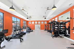 a gym with exercise equipment and windows in the background south twenty cartersville ga