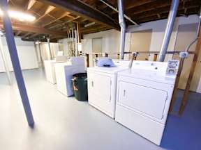 A laundry room with a washer and dryer.