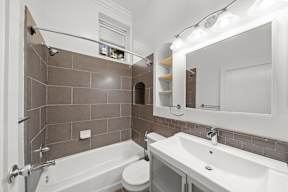 Bathroom in 6128 Wilshire apartment with a shower/tub