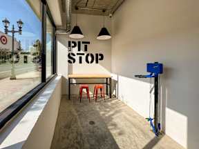 Pit stop store with a view of the outside.