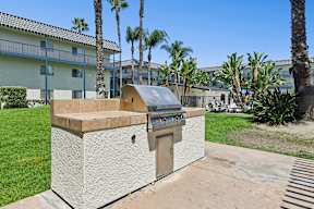 Outdoor BBQ area at Oro surrounded by gorgeous tree lined views