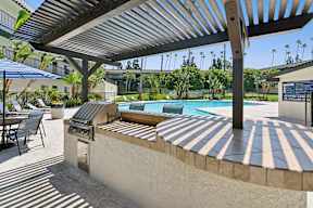 Shaded trellis inside Oro Pool area with built in bbq structure for amazing poolside picnics