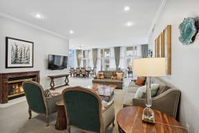 a living room filled with furniture and a fire place