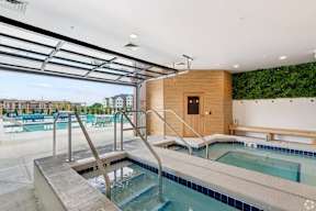 A cold plunge, hot tub and sauna located at Deforest Yards apartments in DeForest, WI