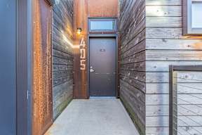 A wooden door with the number 405 on it.