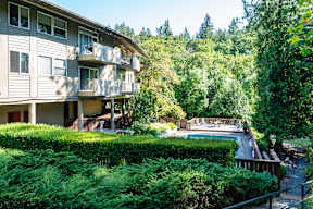 Building with balconies and a sidewalk at Timberlee, Portland, 97221