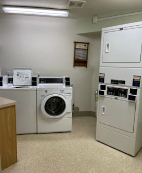 A laundry room with a washer and dryer.