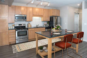 Kitchen with Stove top oven at Zest, Minneapolis