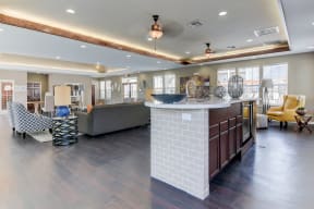 inside of the heights at converse apartments leasing center entertaining area