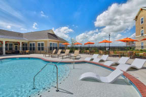 heights at converse apartments pool sun deck with lounge chairs