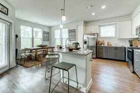 Model Kitchen and Dining Room with Kitchen Island