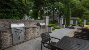 Eclipse Apartments Duluth GA barbecue grilling station poolside