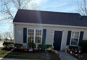 A house with the number 21 on the front.