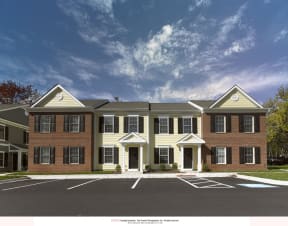 a rendering of a three story apartment building with a parking lot in front of it