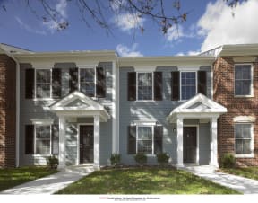 a rendering of a two story home with gray siding and white trim