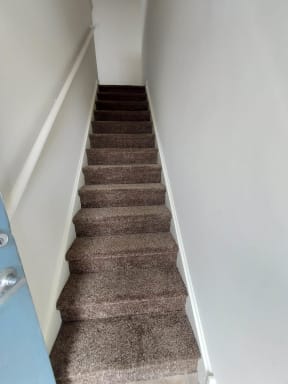 a view of the stairs from the bottom
