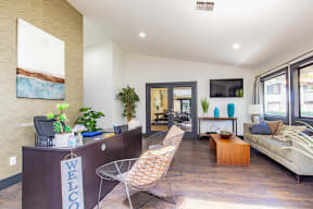 a living room with a desk and chairs at Metro 3610, California