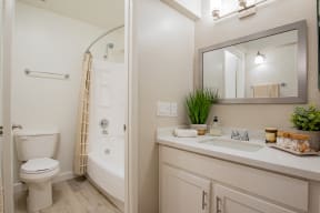 Bathroom with shower toilet and sink at Banbury Apartments Riverside