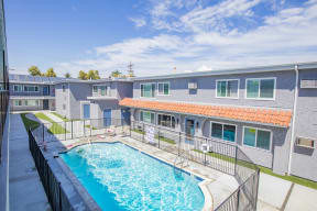 our apartments have a large pool and a building with a roof