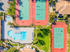 Tennis court and pool amenities at Banbury Apartments Riverside California