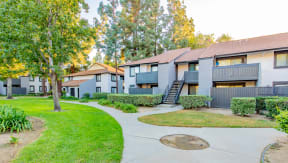 a group of apartment buildings with a yard and sidewalk at Metro 3610, California