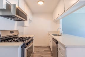 the preserve at ballantyne commons apartment kitchen with stove and sink
