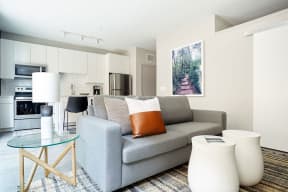 a living room with a couch and a table