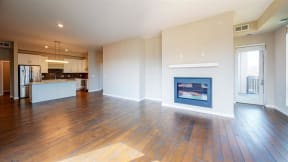 Gas fireplace and wood floors in penthouse