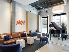 Lobby with grand piano and soft seating