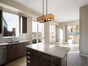 Kitchen island with a lot of windows and natural light