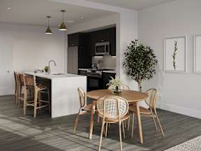 a kitchen and dining room with a table and chairs