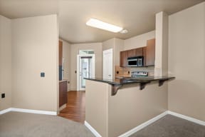 a view of a kitchen with a counter top and