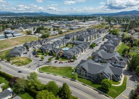an aerial view of a neighborhood of houses in a city