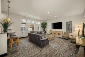 a living room with a couch and a tv