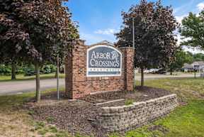 Arbor Crossings apartment sign in Muskegon Michigan