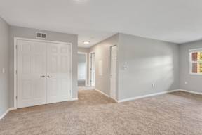 Living room and bedroom layout at Arbor Crossings Muskegon MI