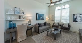 Living rooms with high ceilings and ceiling fans at 2000 West Creek Apartments, Virginia, 23238
