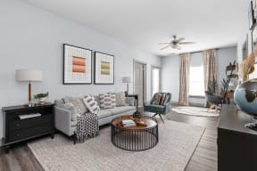 a living room with a couch and a coffee table at the Vue apartments in Indianapolis