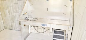 a large open dog washing sink