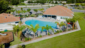Aerial view of pool and clubhouse at Trillium apartments in Melbourne fl