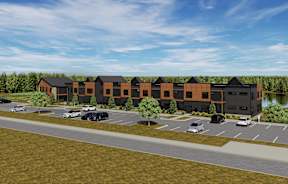 Contemporary apartment building with parking lot at The Villas at Sand Lake Resort Apartments, Sturgeon Lake, Minnesota