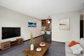 a living room with a couch and a coffee table